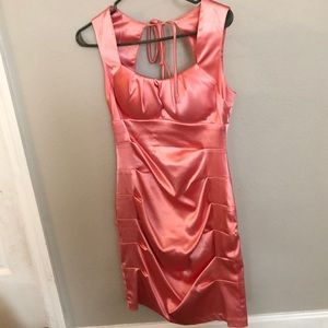 Mini pink dress. Tight fitting
